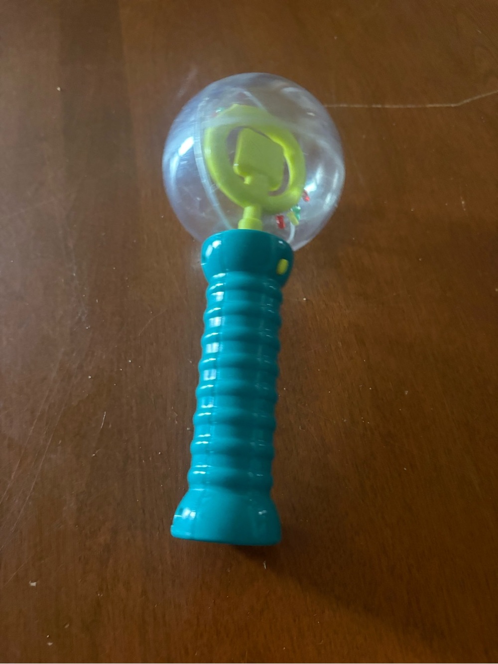Teal Handle Bubble Rattle Toy with Yellow Spinner